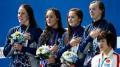 The USA 4x200 freestyle relay ladies celebrate gold at the 2015 Swimming Worlds